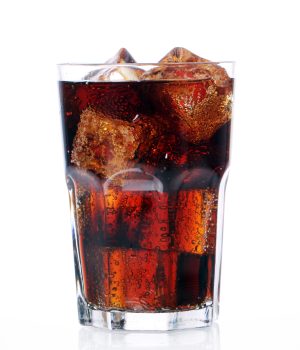 Fresh and cold cola drink in glass